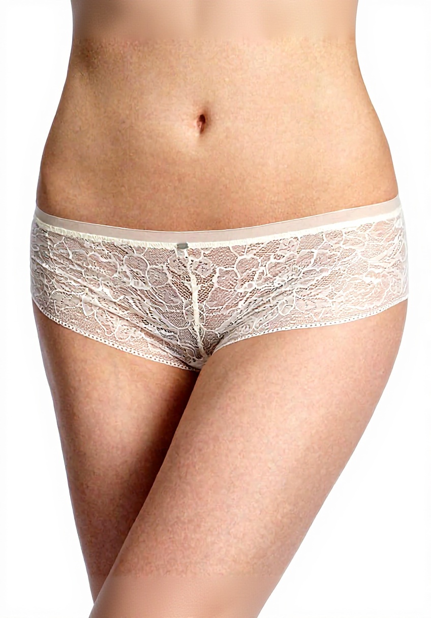 Pavo Monitor Arm installed on a wooden desk with cables organized