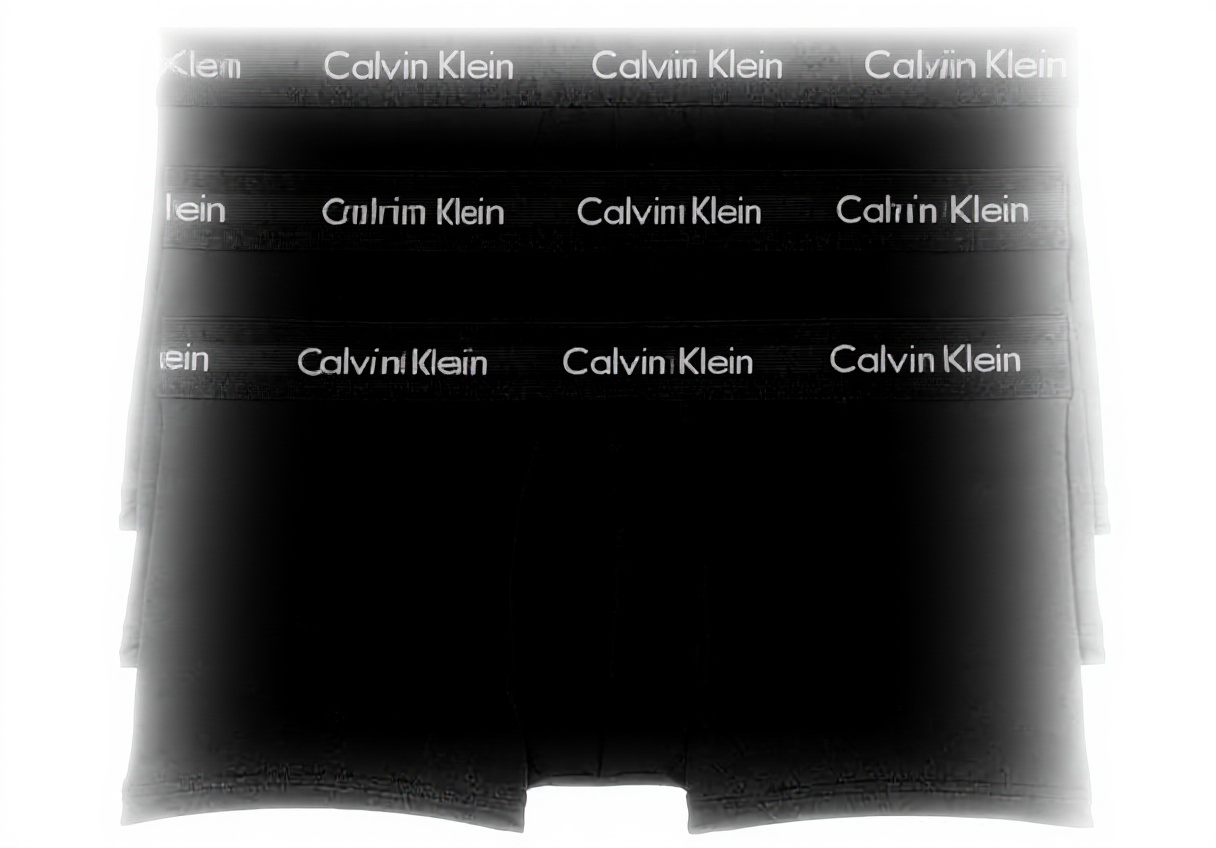 Caleçons Calvin Klein homme lot 3 noir taille basse coton dépliés sur une surface neutre
